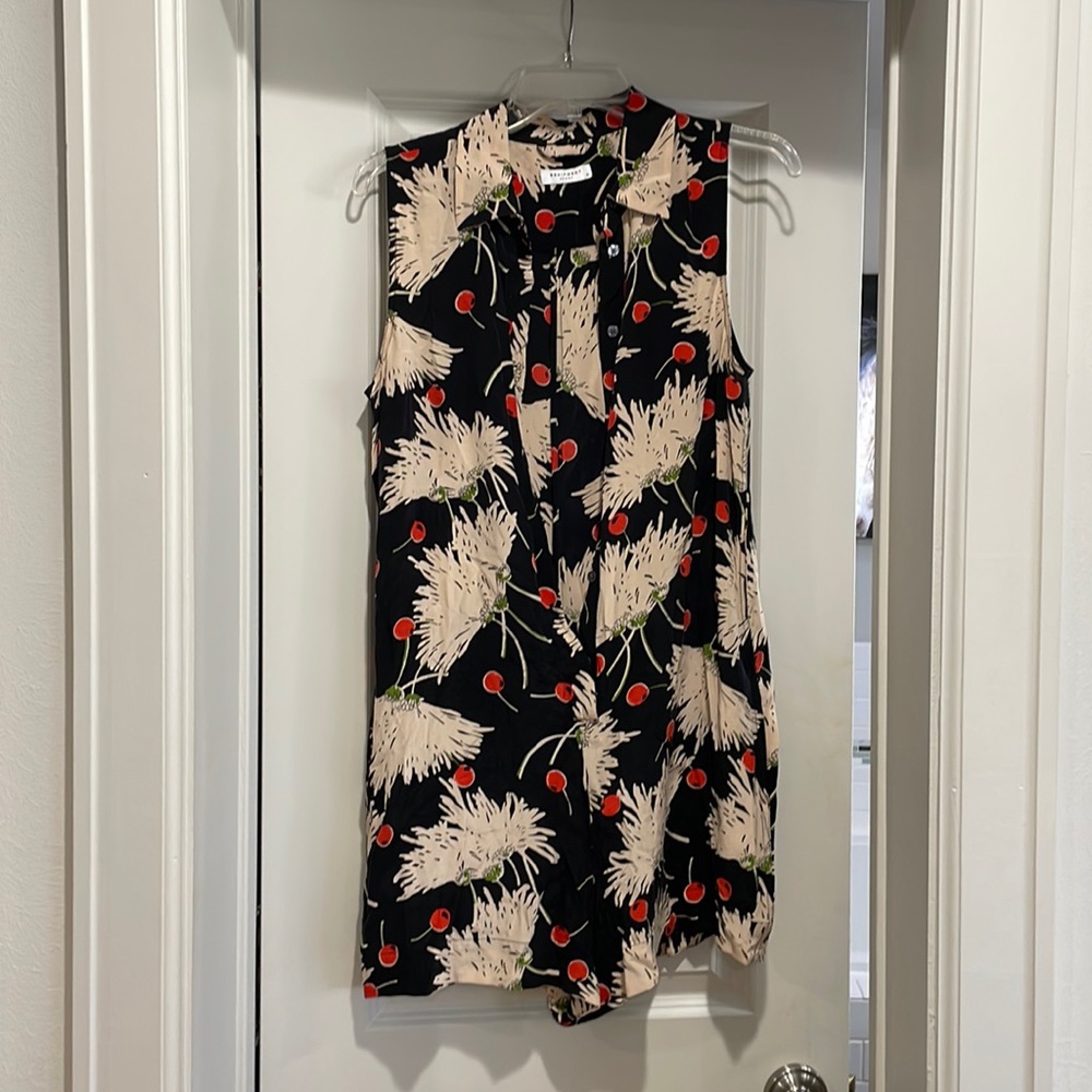 Adorable sleeveless button down romper